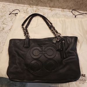 Coach black leather tote w/ dust bag and charms